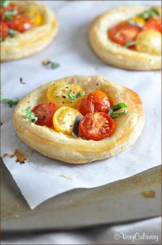 
                    
                        These tomato and basil puff pastry tarts are fresh, light, and delicious. They’re incredibly easy, but look so fancy! from Very Culinary
                    
                