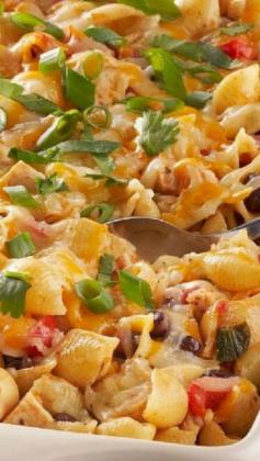 
                    
                        Enchilada Pasta Bake ~ Pasta shells, roasted chicken breast and black beans put the hearty in this cheesy and easy-to-make enchilada bake recipe.
                    
                
