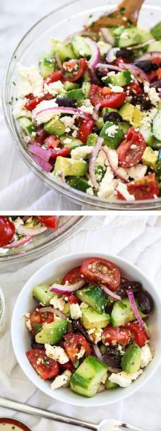 Greek Salad with Avocado and crunchy veggies is my favorite summertime salad with a tangy dressing #recipe by @Heidi Haugen Haugen Haugen Haugen Haugen Haugen Haugen Haugen | FoodieCrush #mediterranean #greeksalad #avocado
