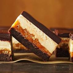 Four-Layer Caramel Crunch Brownies: homemade fudge brownie, caramel, nougat, and chocolate. These look good.