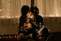 
                    
                        Wrap yourself up in twinkle lights and take a photo. | 20 Ways To Have A Delightful Christmas For Two
                    
                