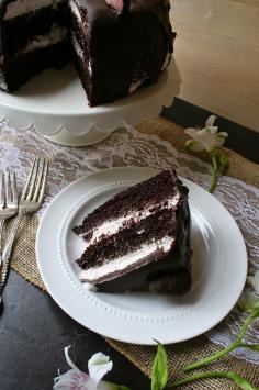 
                    
                        Dark Chocolate Cake with Strawberry Mousse Filling & Chocolate Ganache
                    
                