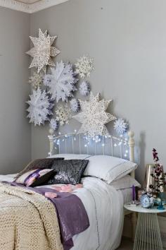 
                    
                        You can create oversized paper snowflakes for a winter wonderland feel:
                    
                