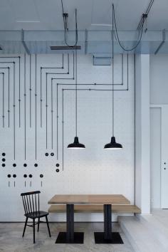 
                    
                        A White Minimalist Bistro In Prague | designed by Mimosa architekti and Modulora
                    
                