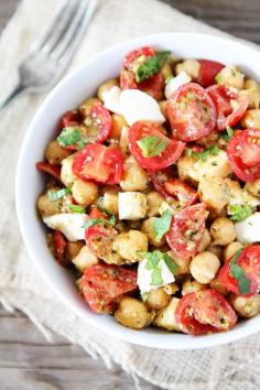 
                    
                        Chickpea, Pesto, Tomato, and Mozzarella Salad Recipe on twopeasandtheirpo... Only 4 ingredients needed to make this healthy salad! #salad
                    
                