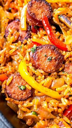 
                    
                        Smoked Sausage and Red Rice Skillet with Charred Onions and Peppers ~ juicy, savory, salty, smoky, tangy, bright and bold.
                    
                