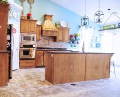 How to Remove Tile Flooring Yourself {with Tips and Tricks} DIY kitchen renovation.