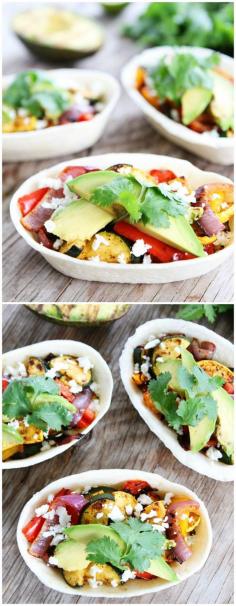 
                    
                        Grilled Avocado and Vegetable Tacos on twopeasandtheirpo... These tacos are a summer favorite!
                    
                