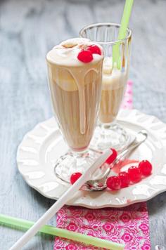 whipped rootbeer float cocktail | 2 ounces chilled whipped pinnacle vodka 1 ounce chilled bailey’s irish cream 1 cup cold root beer 3 large scoops vanilla ice cream, divided maraschino cherries and whipped cream for garnish, if desired | place all ingredients but 2 scoops of ice cream and garnish into a blender. blend until smooth. pour blended ingredients into 2 tall milkshake glasses. add 1 scoop of ice cream into each glass. garnish with maraschino cherries and whipped cream, if desired.