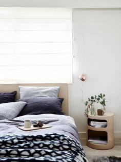
                    
                        Bedroom with Plyroom Flat Out Queen Bed, OH side table, and magnetic wall light. Photo – Eve Wilson. Styling – Jacqui Moore/Greenhouse Interiors.
                    
                