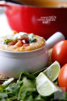 Copycat Chili's Chicken Enchilada Soup // Why go out to eat when you can make your favorite right at home? This copycat recipe is {dare I say} BETTER than the original! If you love Mexican food, you'll love this Enchilada Soup. Garnish wit your favorite toppings and serve with tortilla chips! | Tried and Tasty