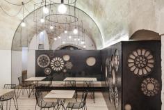 
                    
                        Decorative Motifs Cover The Walls Of This Italian Cafe
                    
                