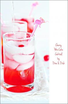 
                    
                        Cherry Poke Cake Cocktail - This refreshing cocktail recipe tastes just like old fashioned Cherry Poke Cake. click through for recipe on www.dineanddish.net
                    
                
