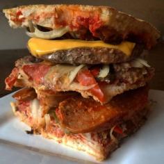 
                    
                        The Vulgar Chef's Epic Leftover Pizza Burger is Also a Club Sandwich #sandwiches trendhunter.com
                    
                