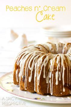 A Spicy Perspective Peach Bundt Cake ~ Peaches n' Cream Cake  Slice into summer with this heavenly Peach Cake, dappled with fresh ripe peaches and drizzled with sweet cream glaze!