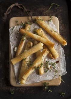 Baked goat cheese phyllo dough "cigars" with honey and thyme