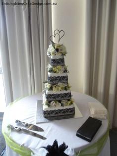 
                    
                        4 tier chocolate mud, caramel mud and white, mud cake decorated with fresh flowers and stands 90cm tall. - Enticing Icing Cake Design, Wedding Planning, Bathurst, NSW, 2795 - TrueLocal
                    
                