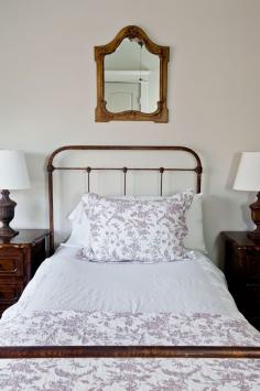 
                    
                        Balancing artwork above the bed
                    
                