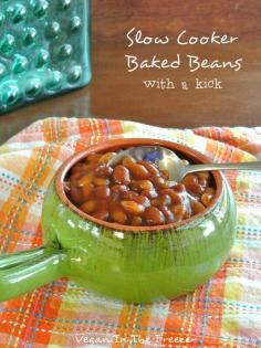 
                    
                        Slow Cooker Baked Beans are cooked with a little bit of a kick added. By dinner time they are perfection and ready to be served to the whole family.
                    
                