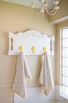 Old headboard turned into a towel holder. Could use as a coat rack also.