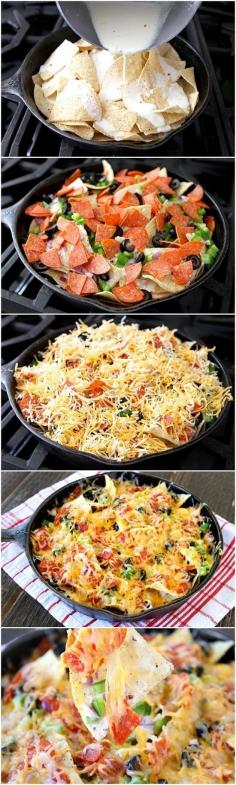 Want to take your camp cooking up a notch? How about on your next trip making Nachos!? Yes, these pizza nachos are made for the cast iron skillet so they are easy to do over the campfire! #cheese #campfire #camp #recipe