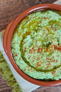 Roasted Garlic Kale Hummus Recipe: classic hummus w/ the superfood kale blended in.