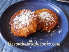 Pineapple Fritters - 1 1/2 cups all-purpose flour 2 tablespoons white granulated sugar 1 tablespn baking powder 1 (20 ounce) can crushed pineapple, drained 1/2 c milk 1 c cooking oil Whisk flour, sugar and baking powder in a bowl. Add crushed pineapple and milk. Stir until dough sticks together. (If it is too thin, add more flour. If too thick, add more milk). Drop into hot oil. Brown on each side. Makes 12 fritters. Drizzle on syrup or powdered sugar. Enjoy!