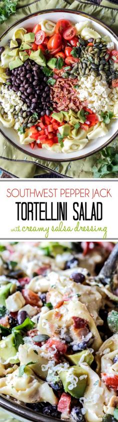 Make ahead, favorite potluck Southwest Pepper Jack Tortellini Salad = cheesy pillows of tortellini, sweet corn, black beans, avocado, bell peppers, etc. bathed in Creamy Salsa Dressing and garnished with bacon, Pepper Jack, sunflower seeds.  Oh my YUM! #tortellini #pastasalad #southwest #salad