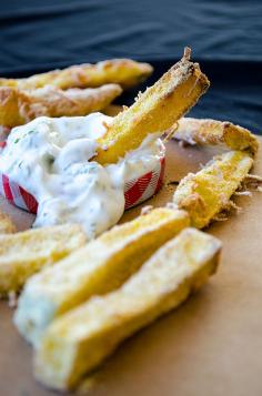 Baked zucchini fries. These zucchini sticks are crunchy on the outside and perfectly cooked inside. They are the healthier version of french fries as they are baked in oven with no oil. These are made with cornmeal, so they are glutenfree too.| giverecipe.com | #zucchini #snack #appetizer #glutenfree #fries