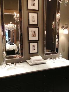 Love the tall mirrors with the photos in between. His and her modern bathroom ideas