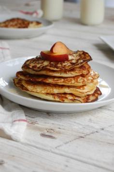 
                    
                        Honey Cornbread Pancakes with Peaches are light, slightly sweet and gluten free.  These cornbread pancakes make the perfect brunch or breakfast topped with fresh peaches and an extra drizzle of honey. // A Cedar Spoon
                    
                