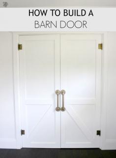 
                    
                        How to build a Barn Door. A full DIY tutorial on how to build an awesome Barn Door for your house on dreambookdesign.com
                    
                