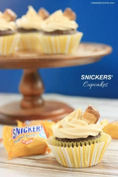 SNICKERS® Cupcakes Recipe. These Dark Chocolate Cupcakes are topped with Caramel Buttercream Frosting and SNICKERS® Peanut Butter Squares.#WhenImHungry #ad