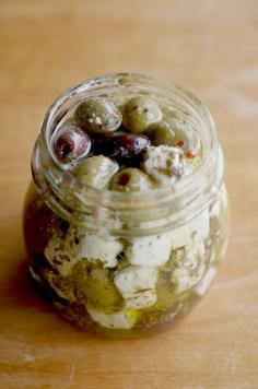My Catholic Kitchen » Marinated Olives and Feta  1 cup extra virgin olive oil  1/2 teaspoon dried oregano  1/2 teaspoon dried thyme  1/4 teaspoon dried rosemary  1/4 teaspoon black pepper  1/4 pound assorted Olives  1/4 pound feta cheese