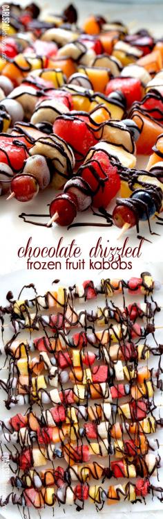 Chocolate Drizzled Frozen Fruit Skewers / Kabobs - Have you ever had frozen fruit? It tastes like candy! Freeze your favorite fruit then drizzle with chocolate for the perfect light dessert, refreshing snack, or guiltless indulgence. I make these ahead of time and keep them in my freezer to munch whenever I have a chocolate fruit craving!