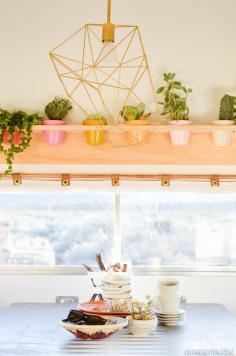 plant pot rack! perfect for succulents. I pinned this mainly for sara. The Nugget: Vintage Trailer Makeover Reveal!!!