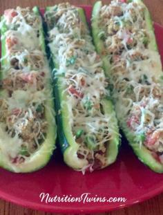 
                    
                        Baked Zucchini Boats | Only 114 Calories | Delicious way to get veggies & protein | Great satisfying appetizer to eat less at the meal | For MORE RECIPES please SIGN UP for our FREE NEWSLETTER NutritionTwins.com
                    
                