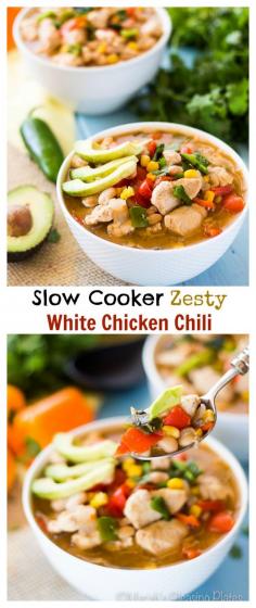 This Slow Cooker Zesty White Chicken Chili makes making dinner a breeze. Juicy chicken pieces, roasted peppers, and white beans make this a protein and fiber packed meal.