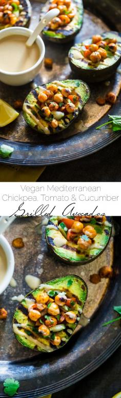 
                    
                        Vegan Mediterranean Chickpea Stuffed Grilled Avocado - Grilled avocado is stuffed with fresh cucumber, tomato and crispy grilled chickpeas! A drizzle of tahini makes this a delicious, healthy and easy, vegan dinner for under 250 calories! | Foodfaithfitness.com | Taylor | Food Faith Fitness
                    
                