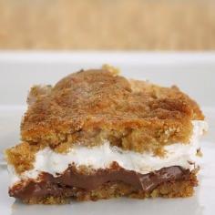 Smores bars: layer of cookie dough, layer of chocolate, layer of marshmallow fluff and final layer of cookie dough