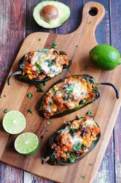 Mexican Stuffed Peppers.  Roasted poblanos stuffed with chorizo, rice, beans, corn, and cheese! | hostthetoast.com