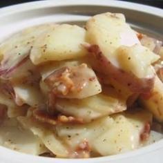 Hot German Potato Salad III Ingredients 9 potatoes, peeled6 slices bacon3/4 cup chopped onions2 tablespoons all-purpose flour2 tablespoons white sugar 2 teaspoons salt1/2 teaspoon celery seed1/8 teaspoon ground black pepper3/4 cup water1/3 cup distilled white vinegar