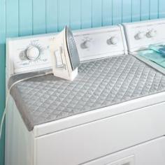 Quilted Ironing Mat - Over-Dryer Fabric Ironing Board | Solutions. Love this idea instead of pulling out the ironing board :)
