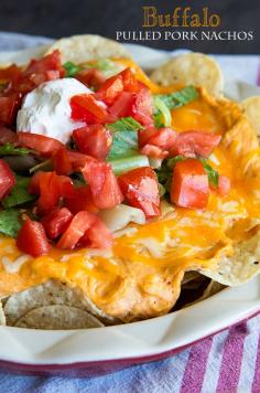 Buffalo Pulled Pork Nachos Recipe - pulled pork takes center stage in this great game day recipe!