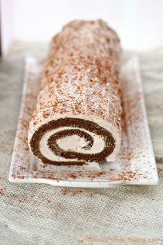 
                    
                        Moist gingerbread roll cake filled with spiced creamy filling a delicious twist on the traditional Christmas gingerbread cake
                    
                