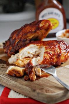 Super Moist Oven Baked BBQ Chicken: I would use organic/pastured chicken with the skin on as well as make my own BBQ sauce (no High Fructose Corn Syrup). This sounds delicious. Marinating all day is the way to go to make those chicken breasts juicy and tender.