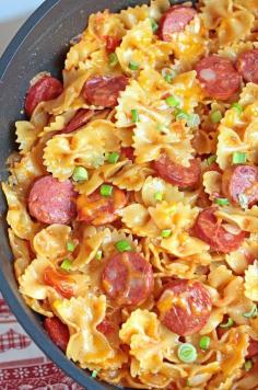 It’s a cheesy pasta dish with Kielbasa sausage and garnished with chopped scallions. Enjoy! #pasta #recipe #noodles #easy #recipes