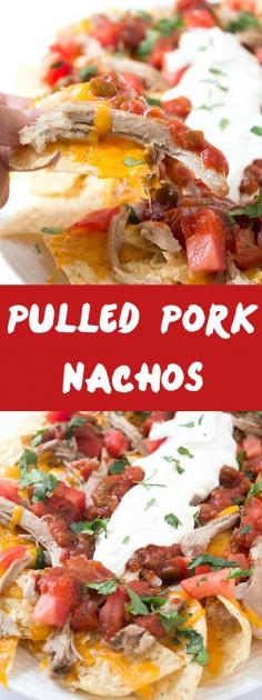 Pulled Pork Nachos - Fall off the bone pulled pork cooked in the slow cooker then loaded with your favorite toppings! Consider them nachos supreme!