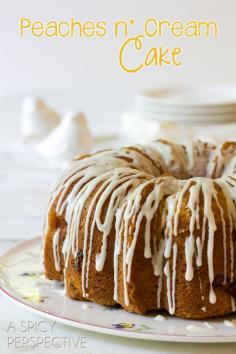 A Spicy Perspective Peach Bundt Cake ~ Peaches n' Cream Cake  Slice into summer with this heavenly Peach Cake, dappled with fresh ripe peaches and drizzled with sweet cream glaze!