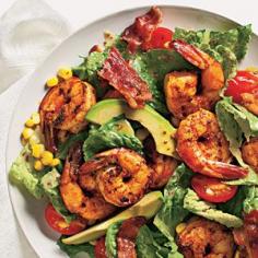 Shrimp Cobb Salad. Prepared this for a potluck with grilled shrimp, romaine, fresh corn, avocado, cherry tomatoes in a light balsamic vinaigrette - w/o the bacon. There was nothing left - yum.